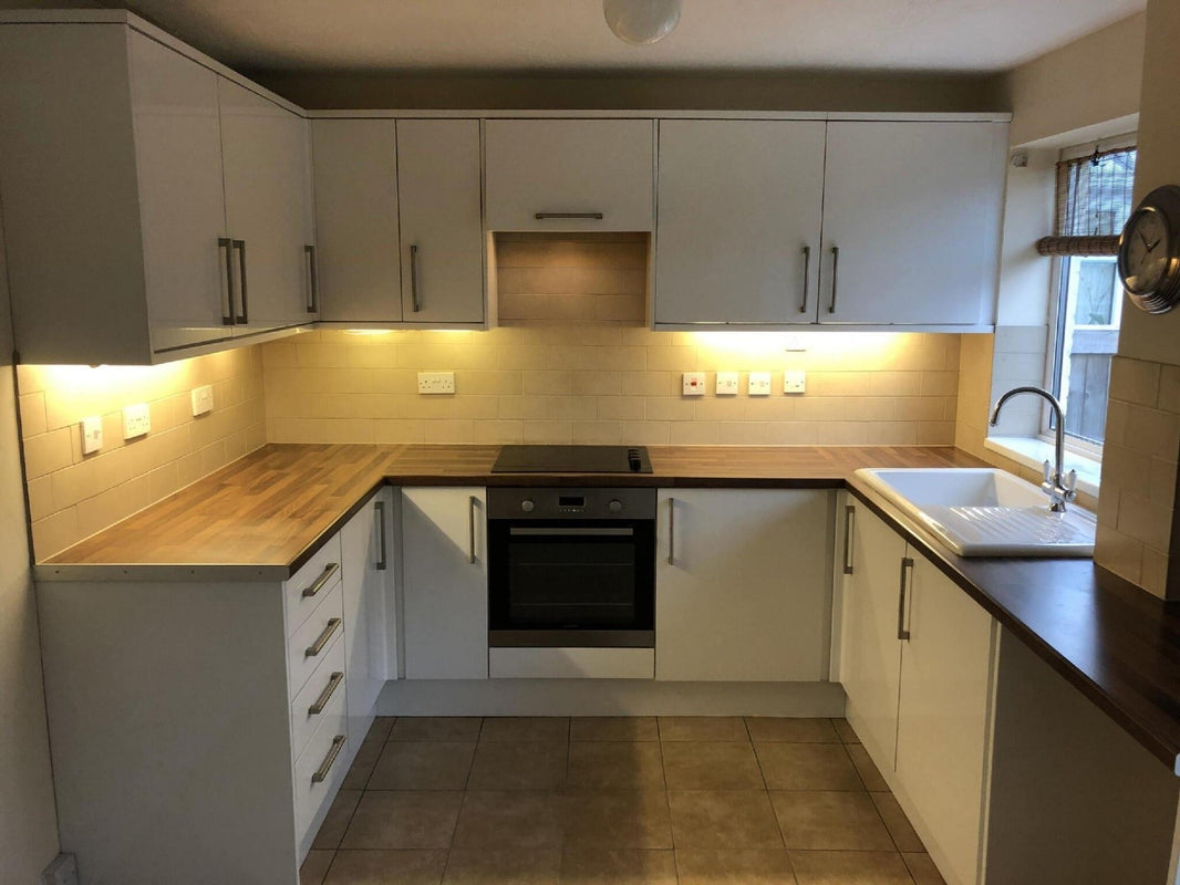 photo showing empty rental property just after old tenant has moved out ready for new tenant to move in and cabinet designed with Lepotec Motion Sensor Lighting