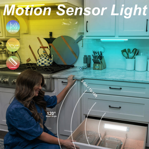 Woman using a motion sensor light in a kitchen