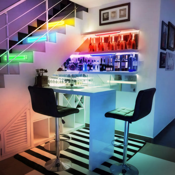 Modern bar setup with colorful lighting and a staircase in the background