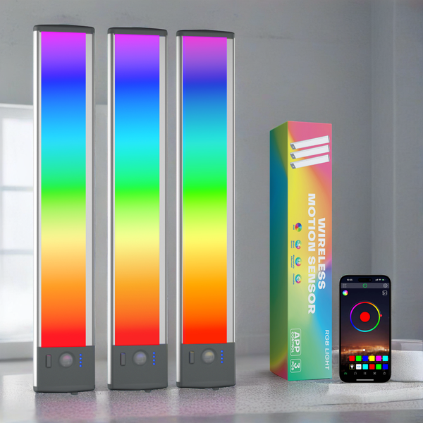 Three colorful cylindrical lights with a box and smartphone displaying app interface.