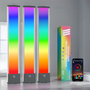 Three colorful cylindrical lights with a box and smartphone displaying app interface.